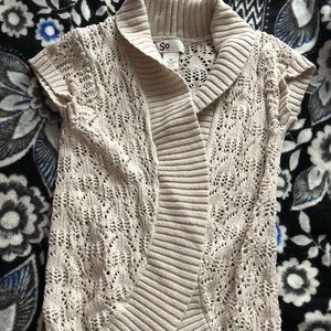 Girl’s beige knit sweater